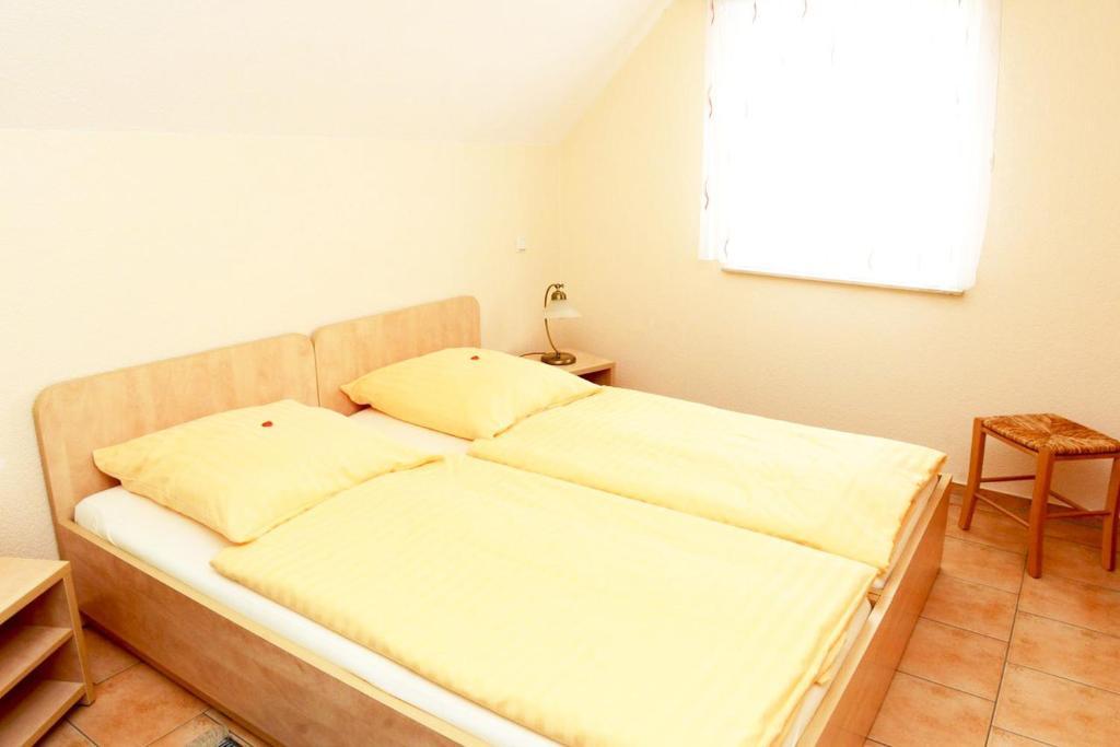 Weißenbergフェリエンヴォヌンゲン ヴェイヒャー ホフアパートメント 部屋 写真